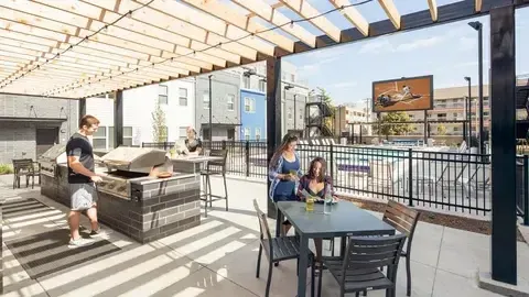 shared outdoor space with tables by the pool