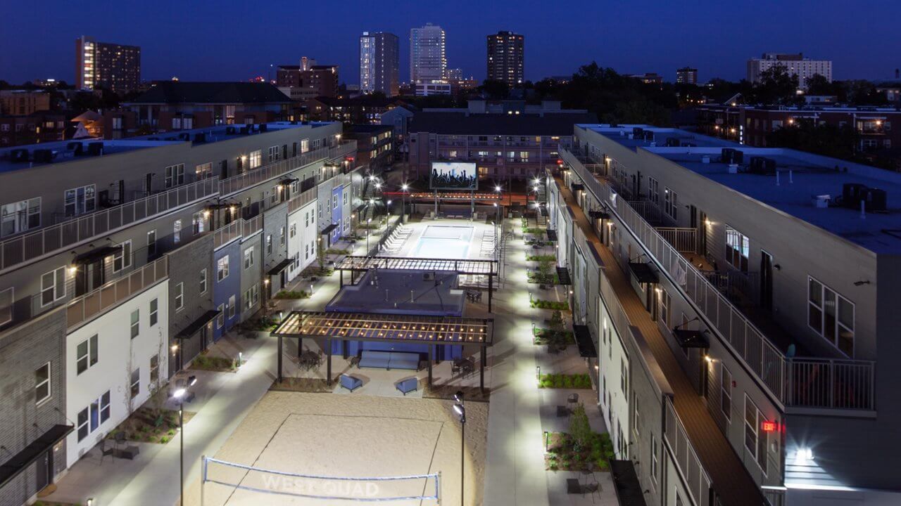 beach volleyball court and pool in inner courtyard