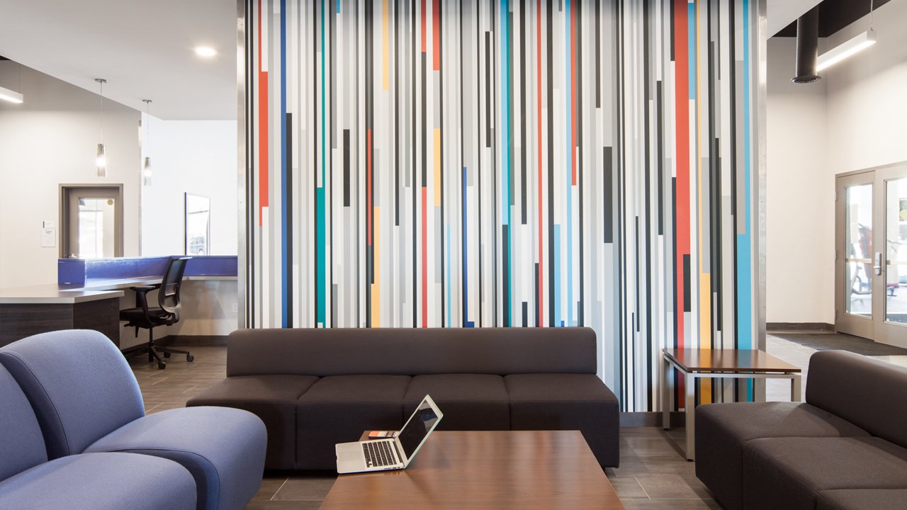 open shared space with couches and desks