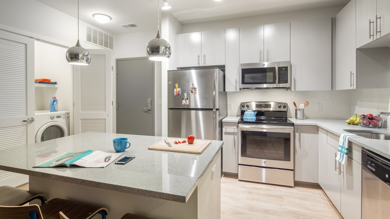 kitchen with stainless steel appliances and island